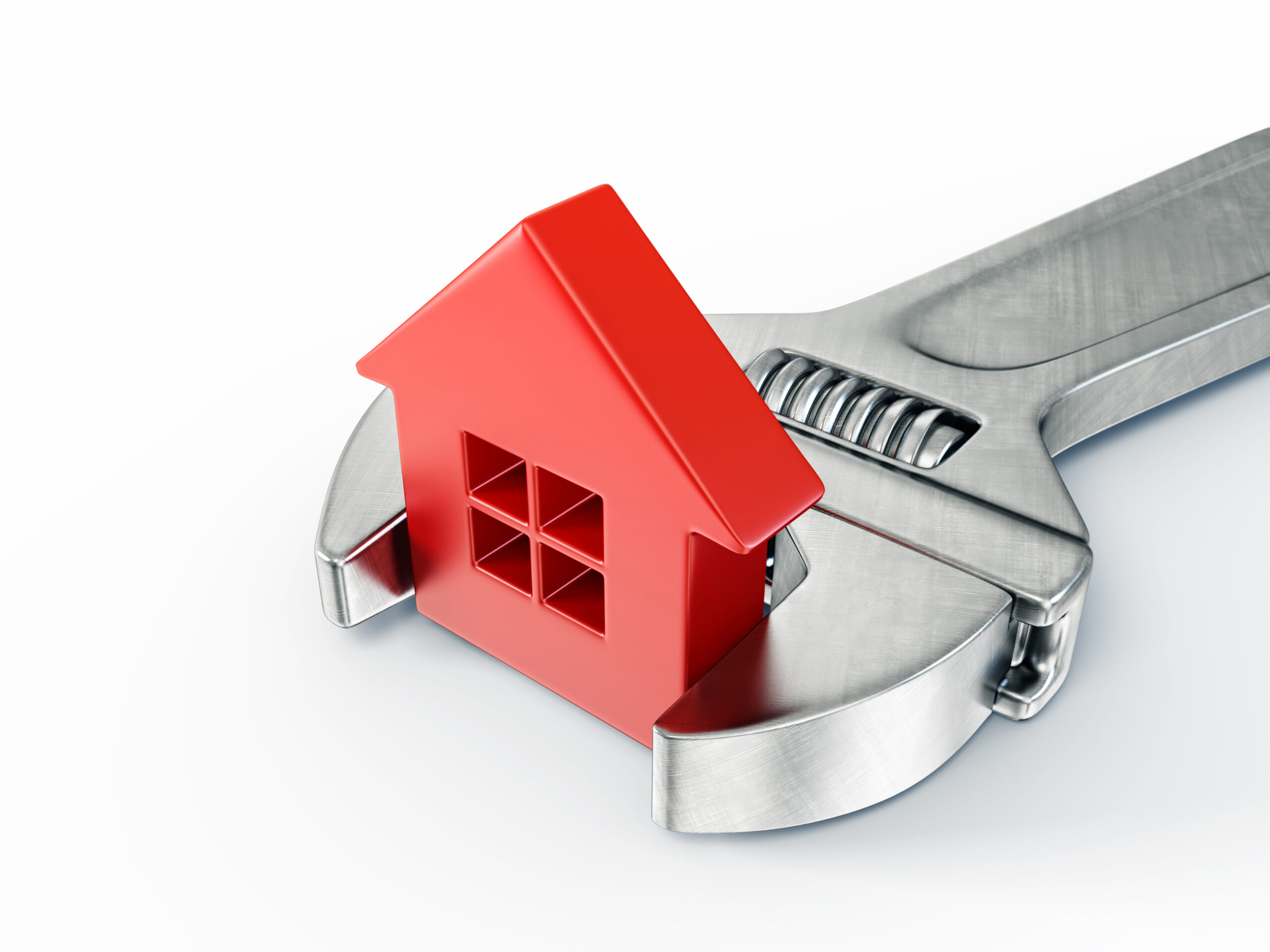 Red,house,in,wrench,isolated,on,a,white,background