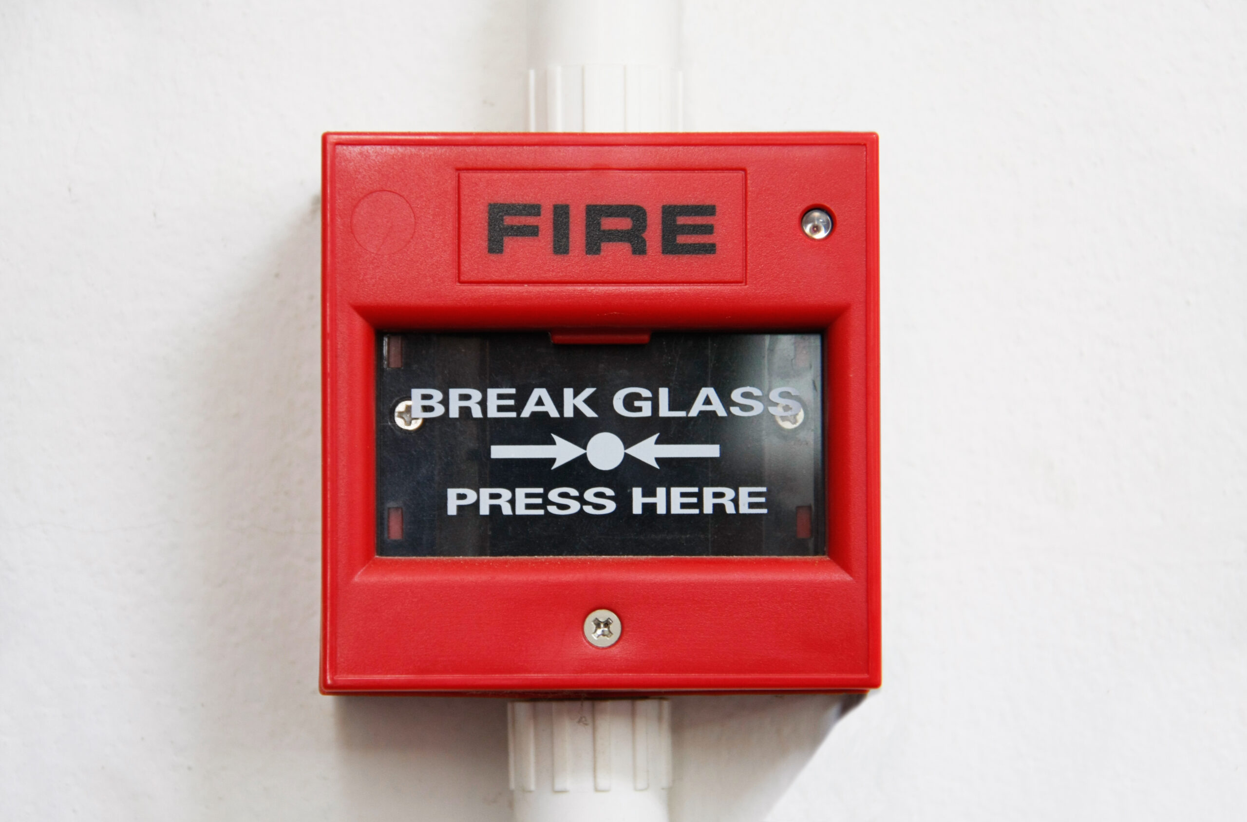 Fire,alarm,box,on,cement,wall,for,warning,and,security